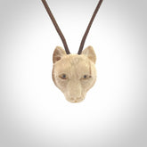 These are small puma cub pendants. They are hand carved from Mammoth tusk and are beautiful. We provide these with adjustable cords. Shipping is free worldwide.